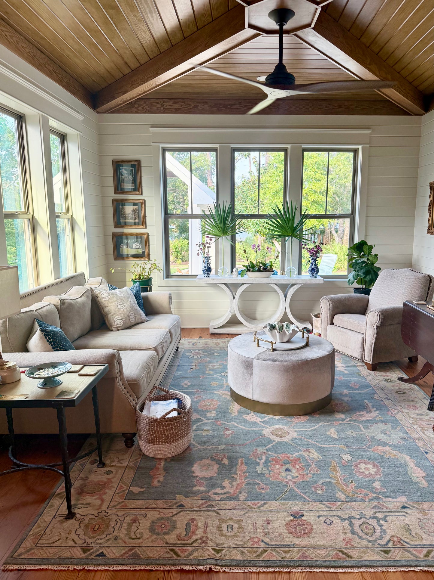 Cottage style Living room with a large window, beige sofa, and Madeline blue modern oushak hand-knotted 100% wool rug.