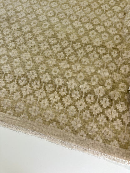 Close-up of Ella Wheat Modern Oushak rug showing warm tan, cream, hand-knotted wool