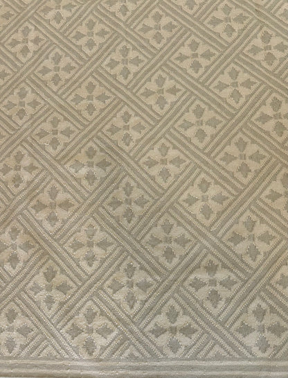 Lois wool flatweave rug with a soft oat and taupe palette