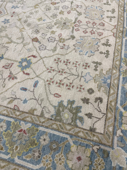 Willa modern Oushak rug, beige with olive, gray-blue, taupe, red, and yellow accents