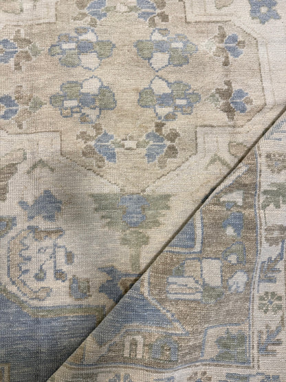 Molly Turkish Oushak rug, light blue with light green, warm tan, cream, and rich brown accents