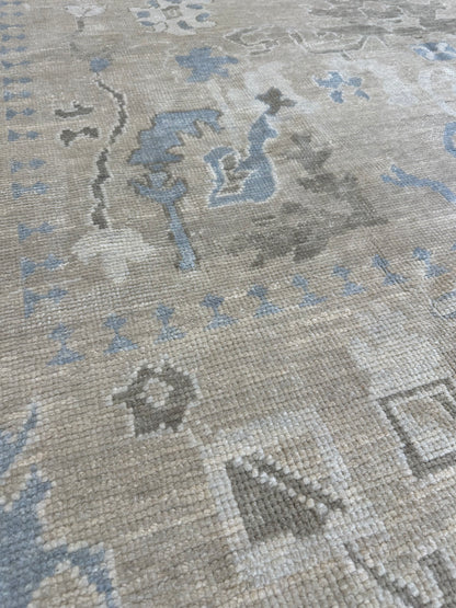 Flora Turkish Oushak rug, warm neutral, light blue, cream — hand-knotted wool area rug