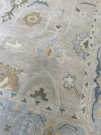 Emerson Green Modern Oushak rug styled in a room, soft beige, gray, cream, blues, gray green, hand-knotted wool