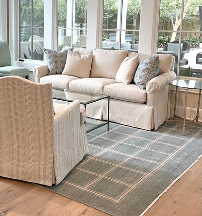 Kate hand-knotted wool modern Oushak rug in gray-blue with soft ivory tones