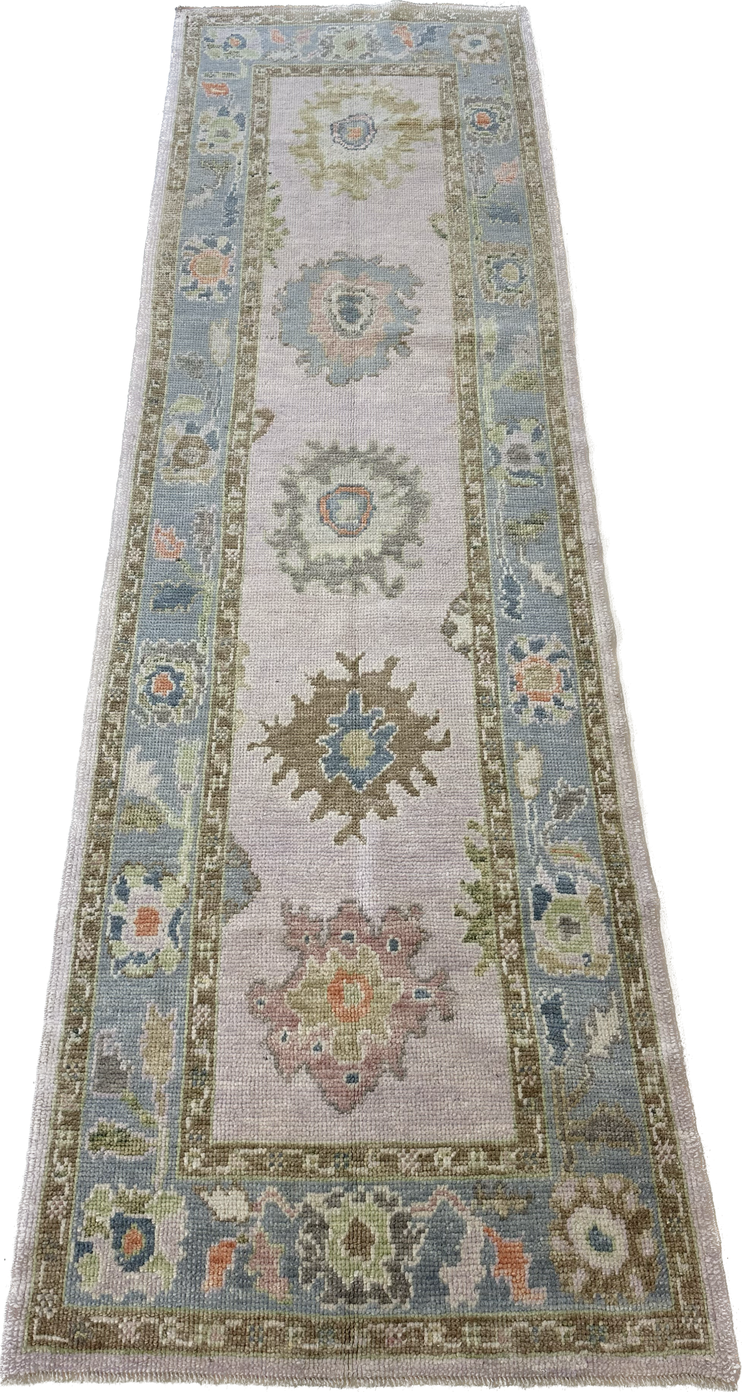 Bailey Turkish  colorful Oushak runner, full view of lavender base, blue border, pink, orange, and brown accents