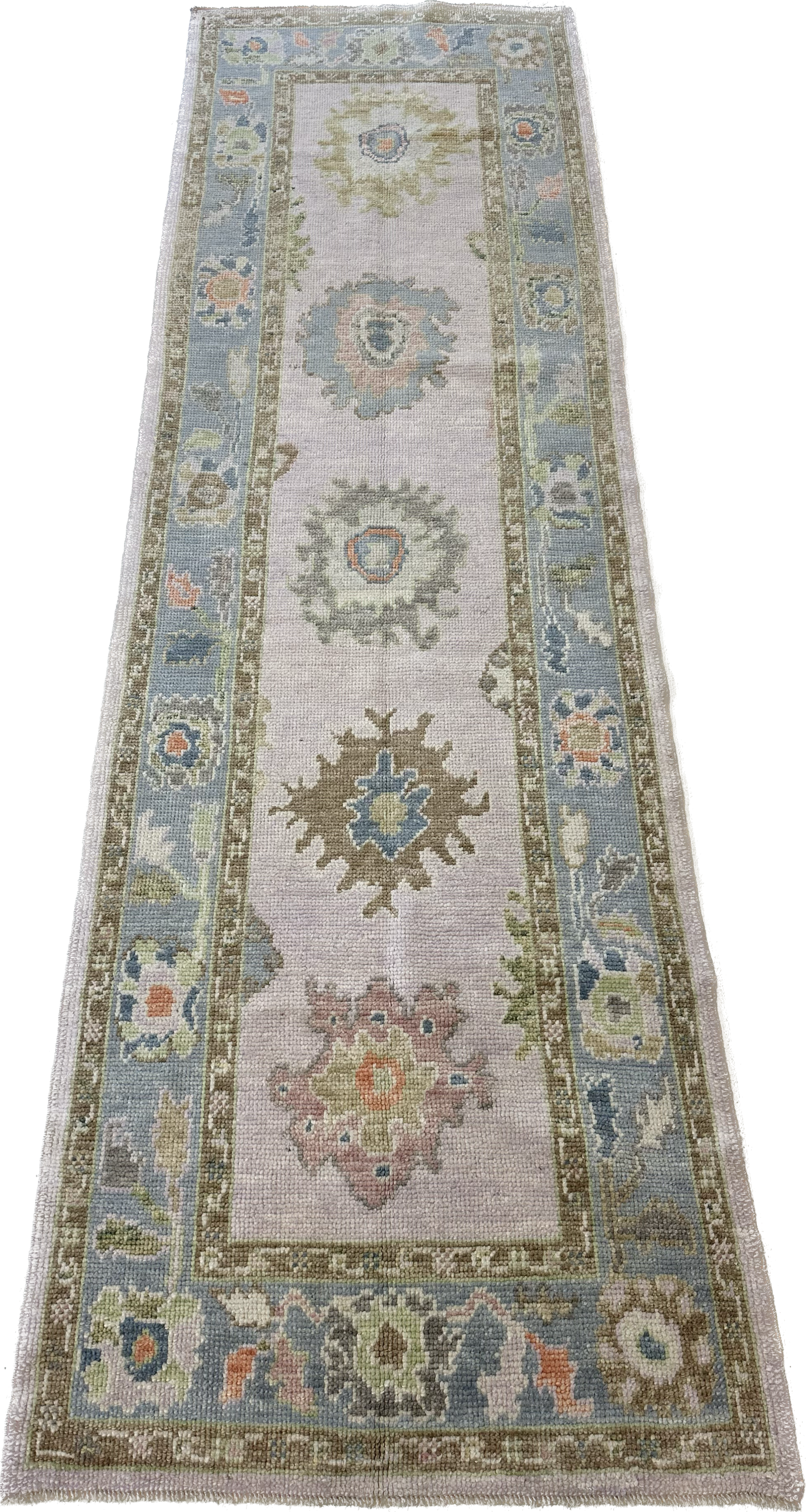 Bailey Turkish  colorful Oushak runner, full view of lavender base, blue border, pink, orange, and brown accents