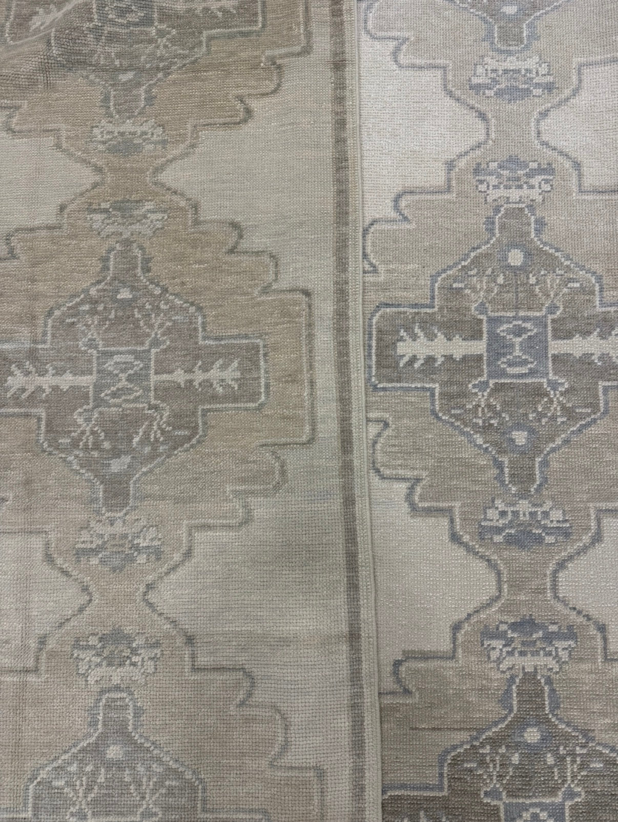 Side by side comparison of neutral turkish oushak runners with blue and green