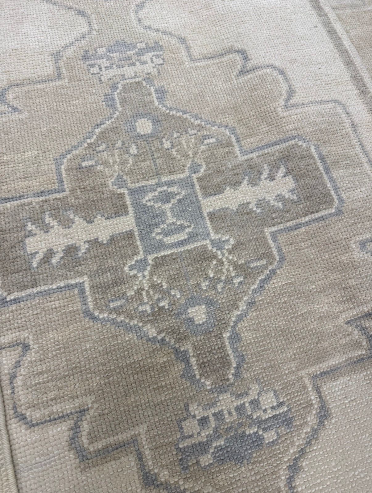 Bethany Blue turkish oushak rug close up — warm gray wool with tan and gray-blue accents, hand-knotted in Turkey, custom sizes available