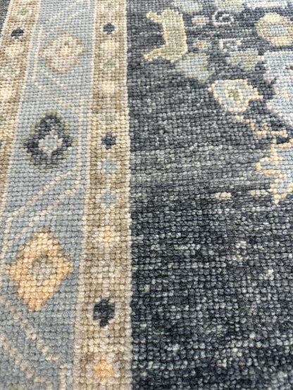 Harriet Turkish Oushak rug, navy foundation with green, tan, and cream accents