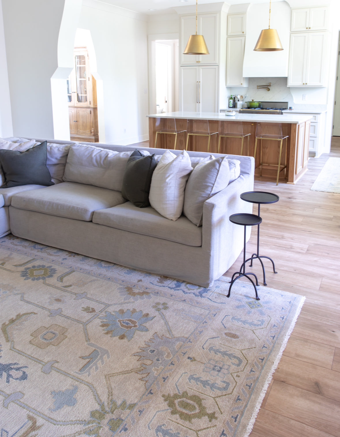 Emmaline blue and green in living room with open floor plan