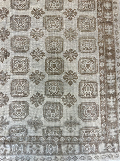 Kira geometric Turkish Oushak rug in warm brown, soft gray, and tan, hand-knotted wool