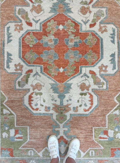 Chelsea Turkish Oushak rug — coral-orange, rust, bright blue, apple green, ivory, warm gray, hand-knotted 100% wool
