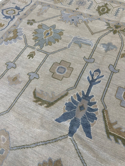 Emmaline Modern Oushak rug styled in a room, beige, gray, cream, mossy green, blue, hand-knotted wool