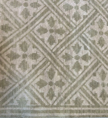 Lola modern Oushak rug with a cream foundation and taupey-green accents, hand-knotted wool