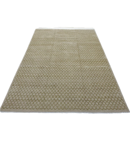 Ella Wheat Modern Oushak rug styled in a room, warm tan, cream, hand-knotted wool