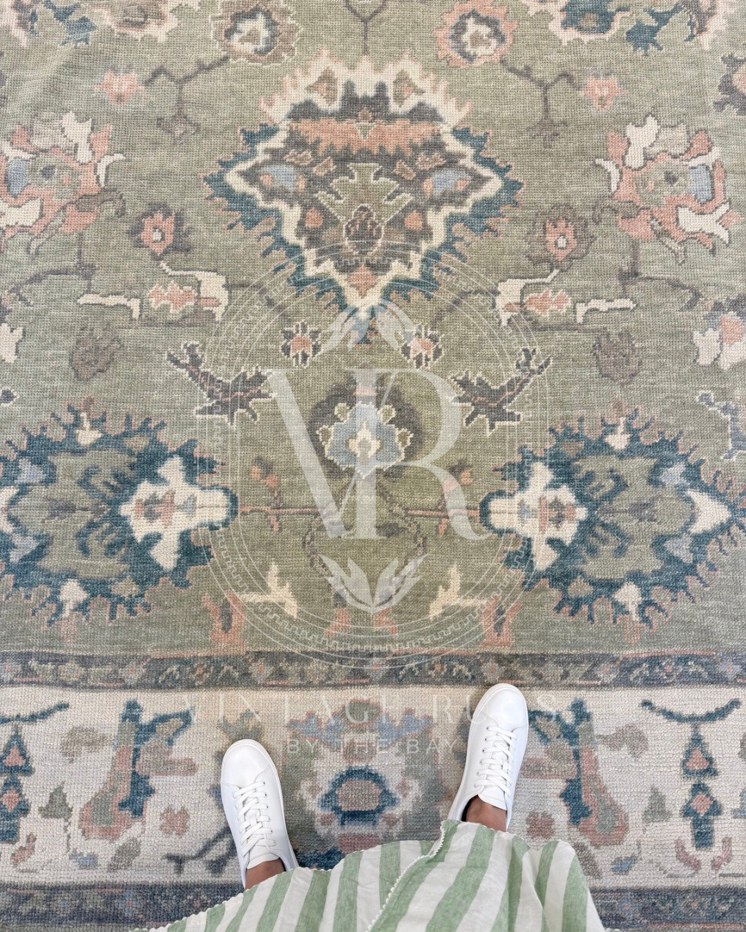 Gertrude Sage Green Turkish Oushak rug featuring a soft sage green base with accents of turquoise, salmon, cream, light blue, and gray in a timeless hand-knotted traditional pattern, perfect for living rooms, bedrooms, and elegant neutral interiors.