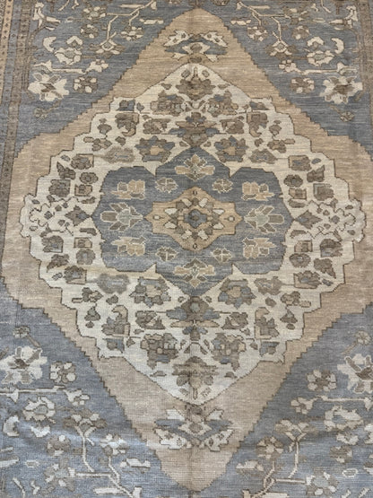 Isabella hand-knotted wool Turkish Oushak rug in gray-blue with tan, cream, and soft green