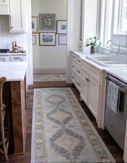 Susie Blue Modern Oushak rug — gray-blue, warm brown border, sage green, tan, cool gray, hand-knotted 100% wool