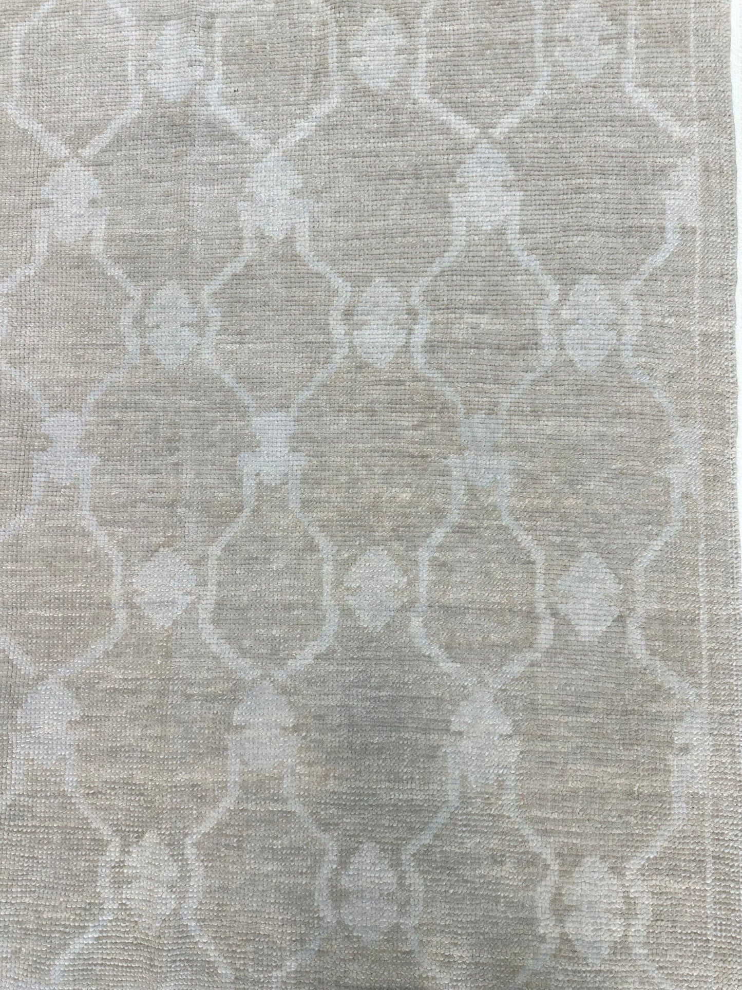 Close-up of Alice Turkish Oushak rug showing warm mushroom, soft cream, hand-knotted wool