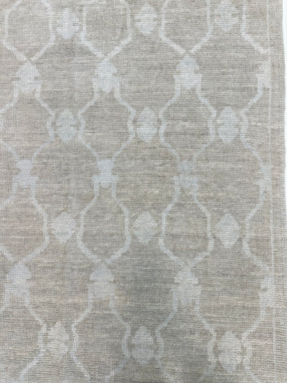 Close-up of Alice Turkish Oushak rug showing warm mushroom, soft cream, hand-knotted wool