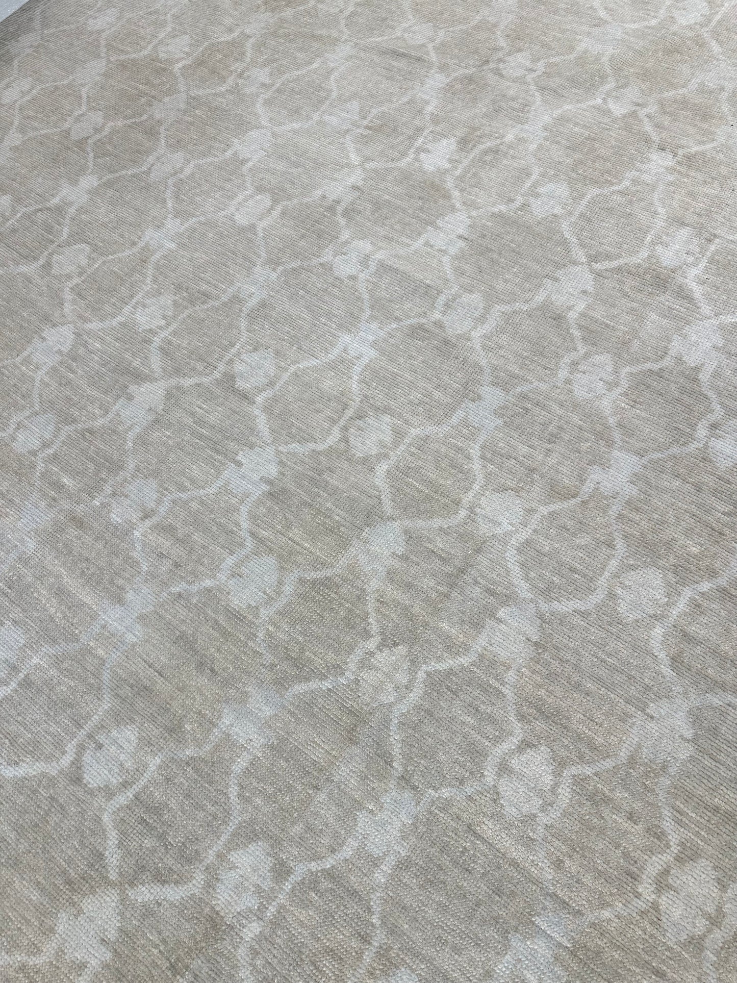 Alice Turkish Oushak rug styled in a room, warm mushroom, soft cream, hand-knotted wool