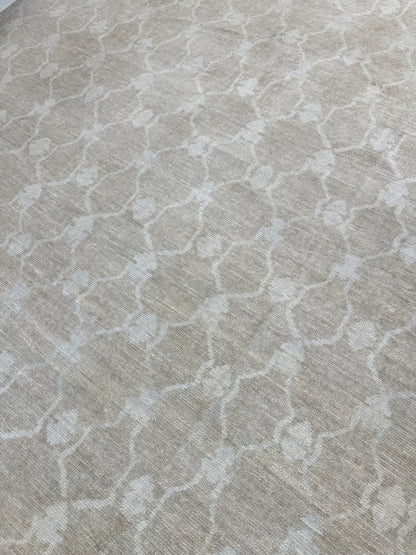 Alice Turkish Oushak rug styled in a room, warm mushroom, soft cream, hand-knotted wool