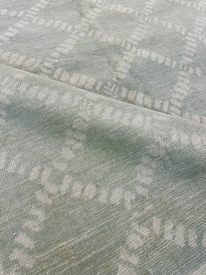 Close-up of Annie Turkish Oushak rug showing muted green, hand-knotted wool