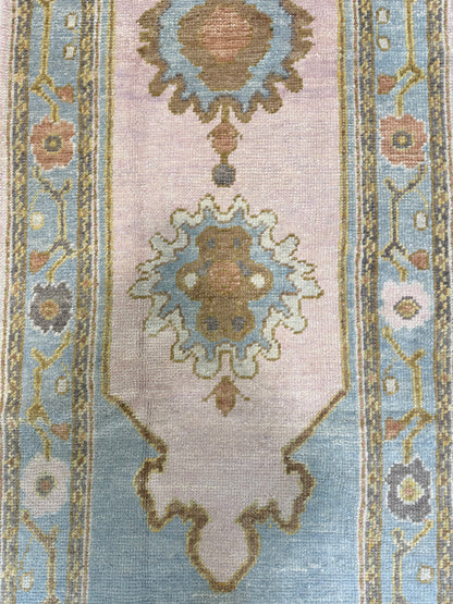 Blaire Turkish Oushak rug — hand-knotted wool in lavender with lavender, light blue, brown, pink, chartreuse, orange