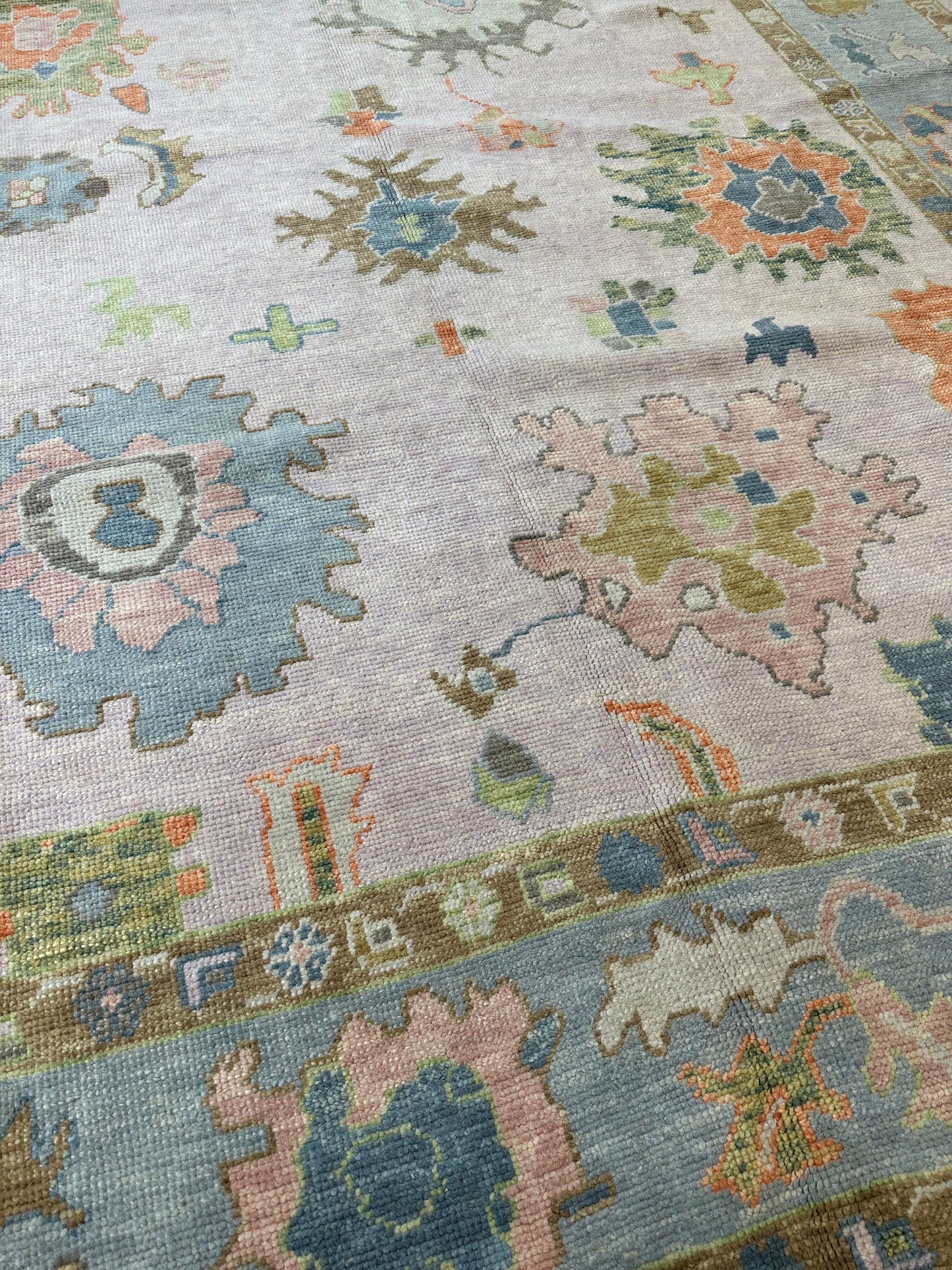 Bailey colorful Turkish Oushak wool hand-knotted rug lavender, blue, orange, browns