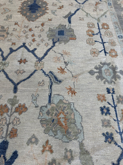 Sophia ivory and gray Turkish Oushak rug with orange, cobalt, light green, and light blue accents, hand-knotted wool