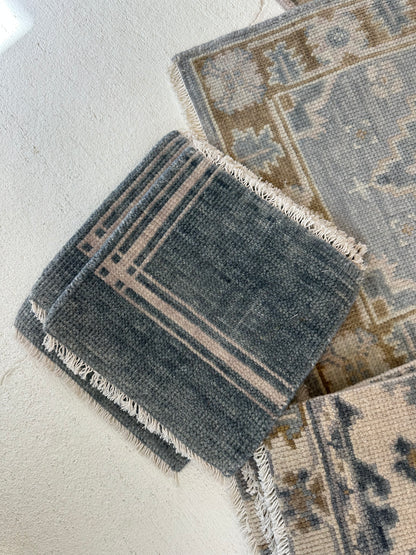 Kate modern Oushak rug, hand-knotted wool with a gray-blue foundation and subtle ivory detailing