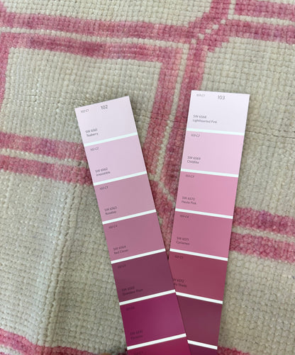 Macie modern Oushak rug, an ivory foundation and lively magenta accents