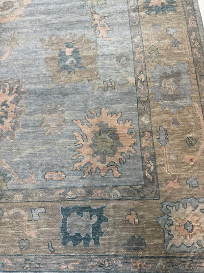 Juliet Turkish Oushak rug, light blue with tan border and delicate pink, teal, and blue accents
