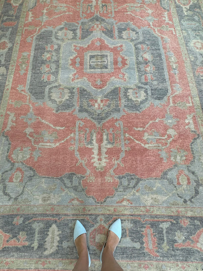 Ruby Turkish Oushak rug, hand-knotted wool with a raspberry red foundation and navy, light blue, light green, tan, and cream accents