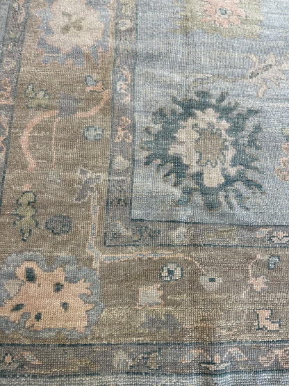 Juliet Turkish Oushak rug, light blue with tan border and delicate pink, teal, and blue accents