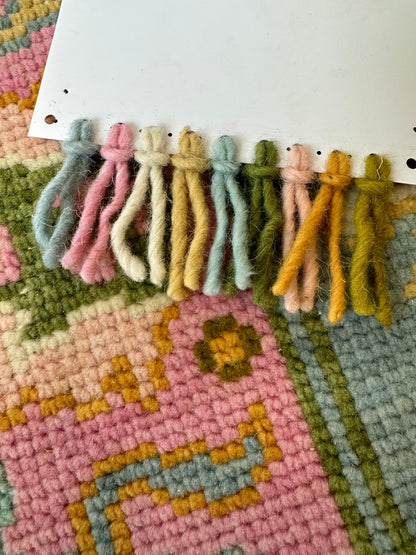 Close-up of Addie Modern Oushak rug showing medium blue, pink border, green, orange, tan, cream, chartreuse-olive, hand-knotted wool (view 13)