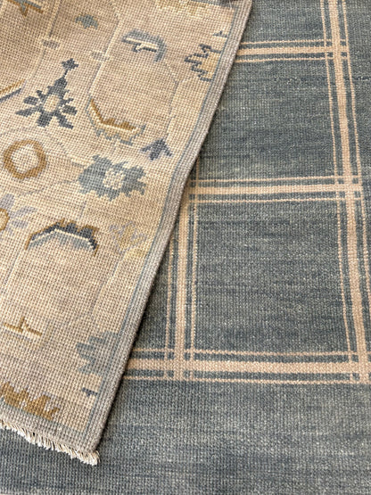 Kate modern Oushak rug, serene gray-blue with ivory accents