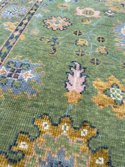 Linda modern Oushak rug, a lime green foundation and slate blue, pink, chartreuse, cream, and orange accents