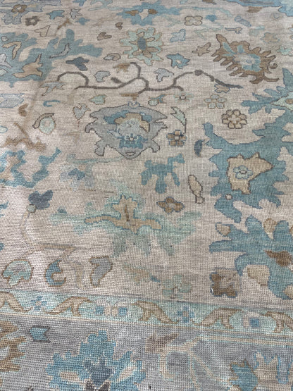 Maggie modern Oushak rug, hand-knotted wool with a warm gray foundation, cool gray border, and aqua and turquoise accents