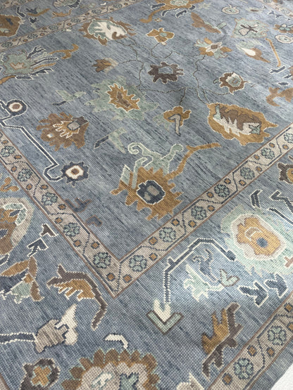 Mae modern Oushak rug, hand-knotted wool with a blue-gray foundation and cream, mustard, sage, and brown accents