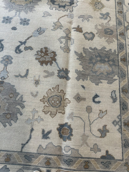 Emma Modern Oushak rug close-up, cream, gray, soft cream, calming blues, hand-knotted 100% wool