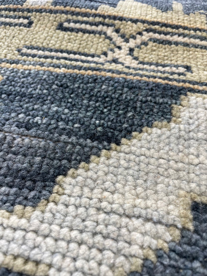 Eloise Modern Oushak rug close-up, moody blue-green, cream, olive, light blue, tan, hand-knotted 100% wool