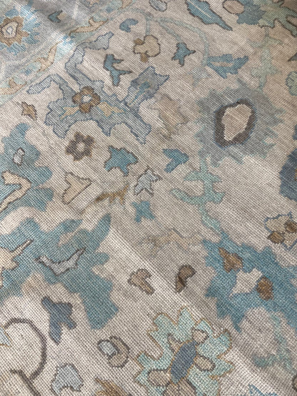 Maggie hand-knotted wool modern Oushak rug in a warm gray foundation, cool gray border, and aqua and turquoise accents