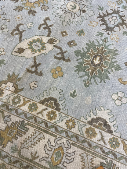 Katherine modern Oushak rug, light blue with cream, tan, ochre, and soft green accents