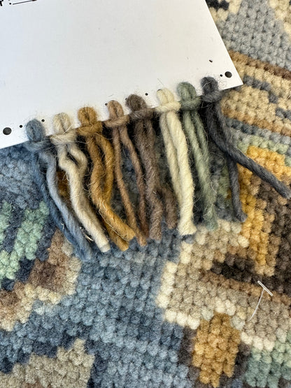 Mae hand-knotted wool modern Oushak rug in a blue-gray foundation and cream, mustard, sage, and brown accents